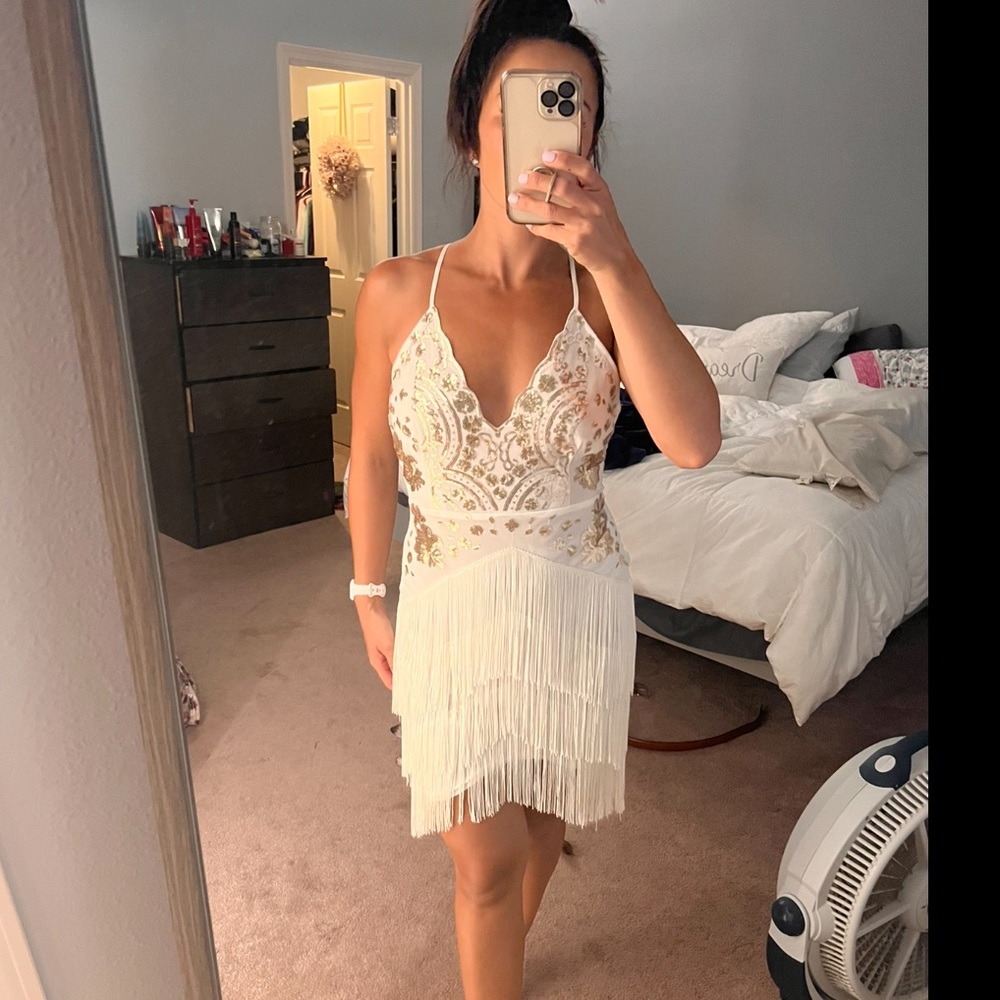 White & gold sequin fringe dress.